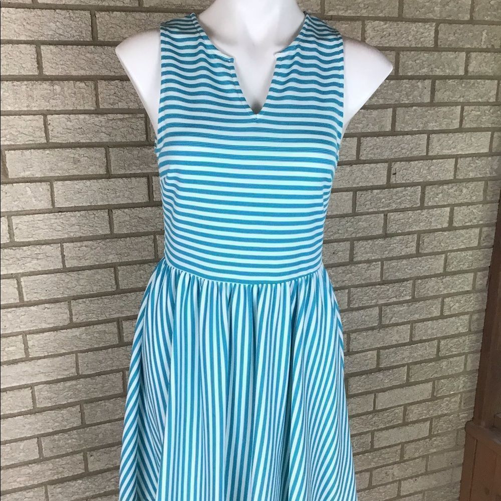 Miami turquoise and white dress size medium in junior size.